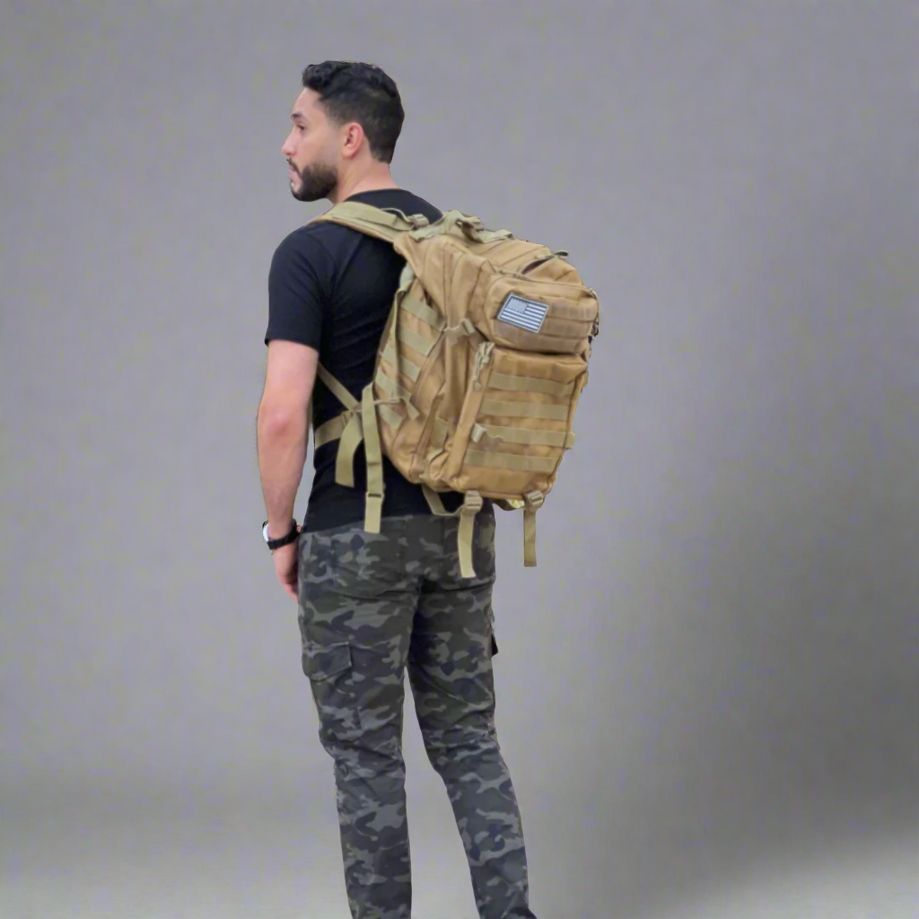 A traveler wearing Nanomads "Journey" military style backpack