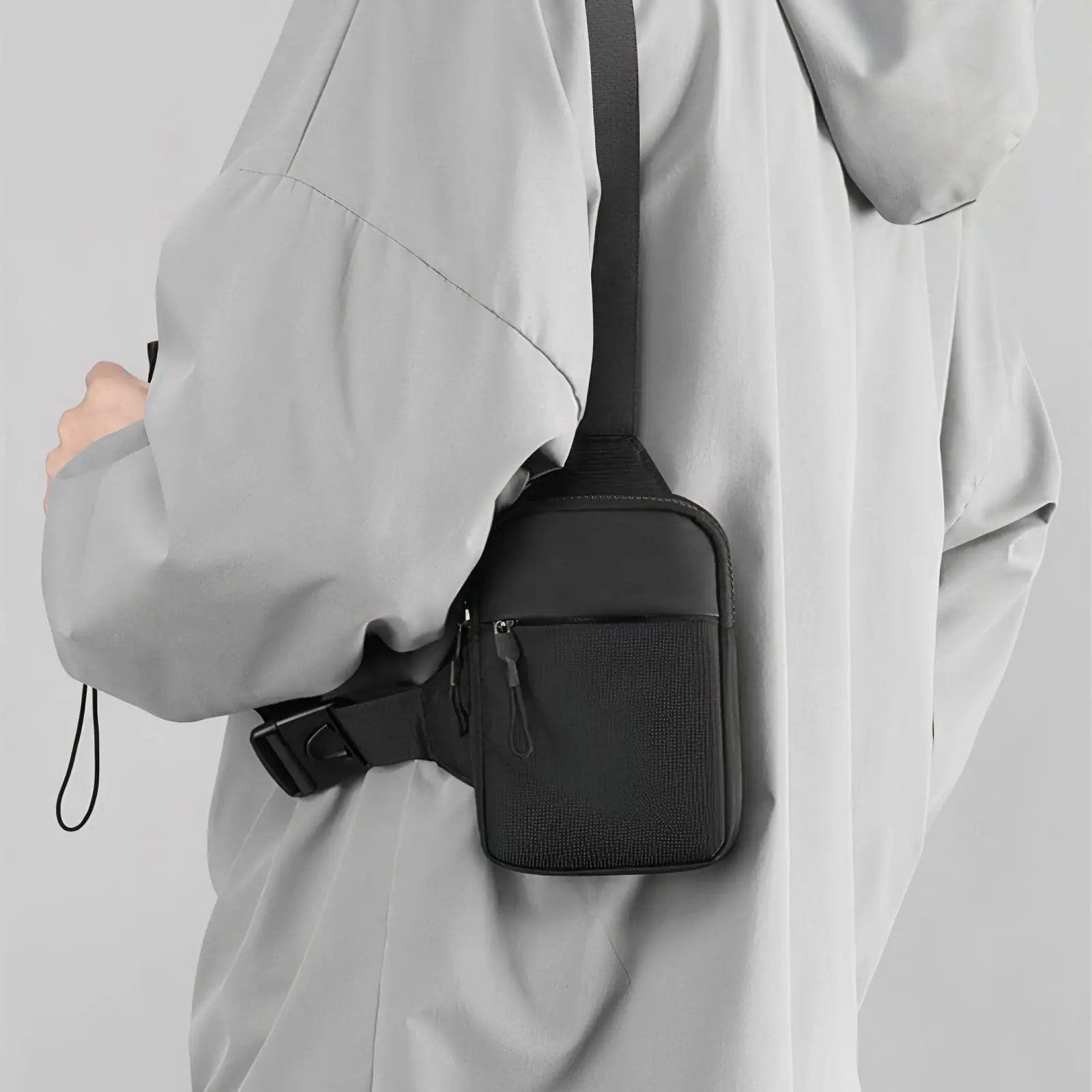 Person Holding a Travel Sling Bag